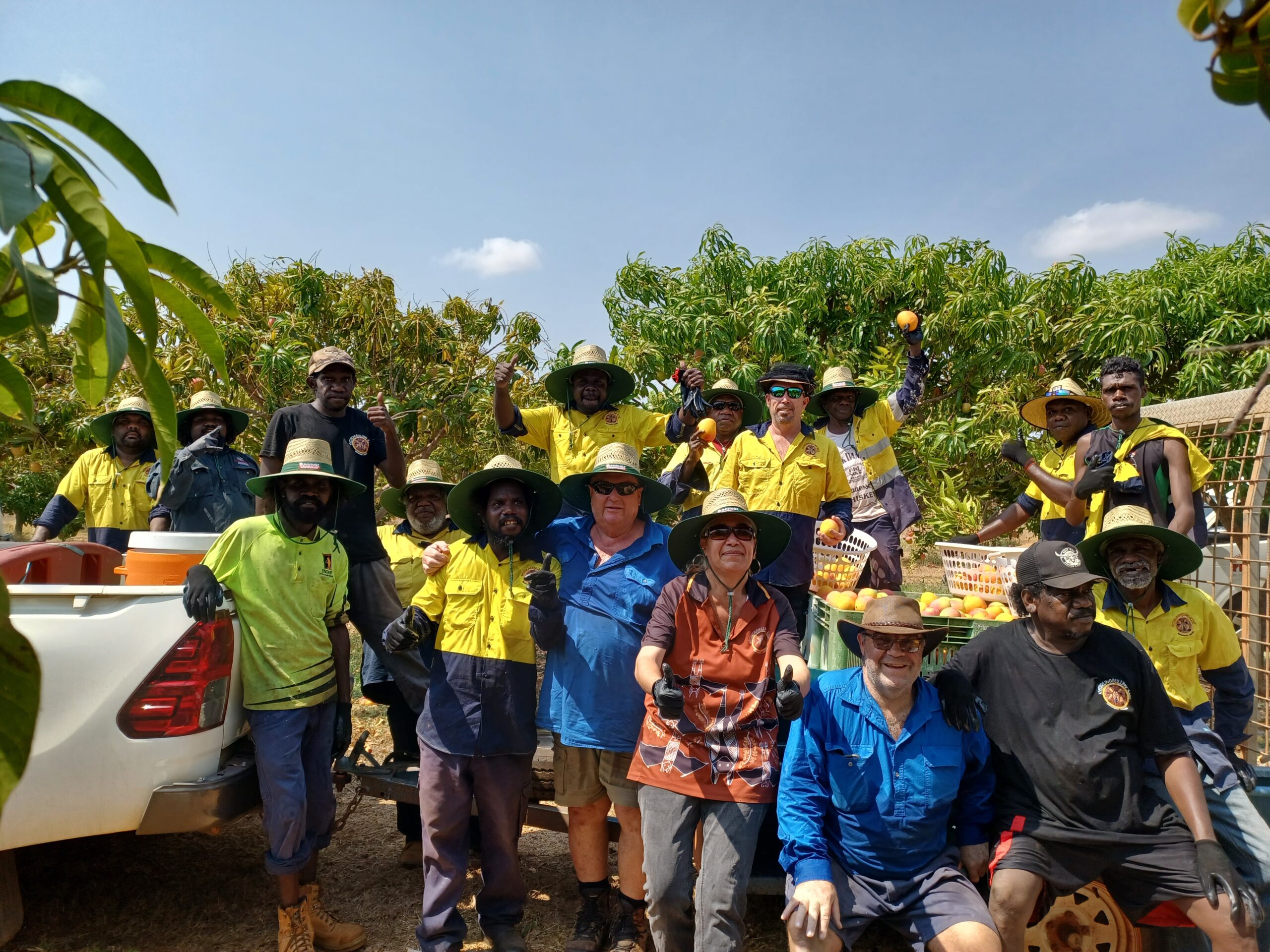 Team pictured with the produce they picked